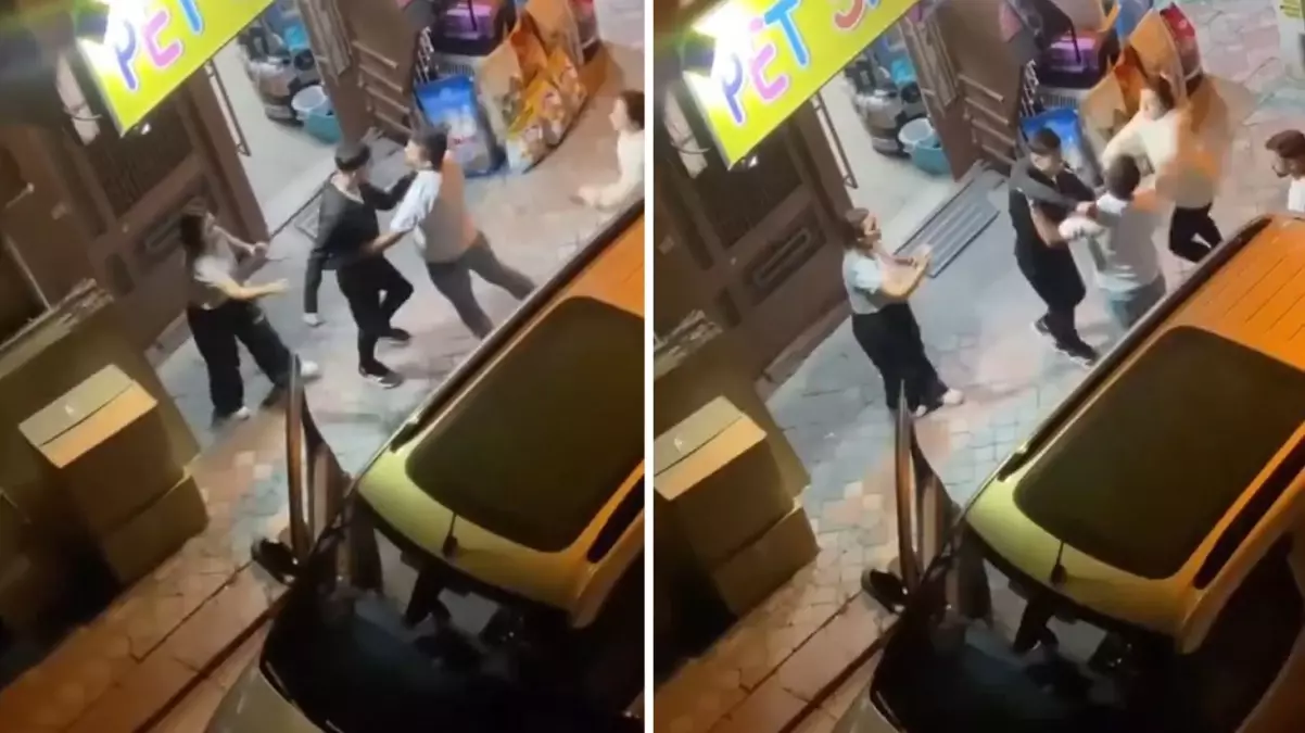 Yanındaki kadına aldırmadan tartıştığı adamın boğazına bıçak dayadı